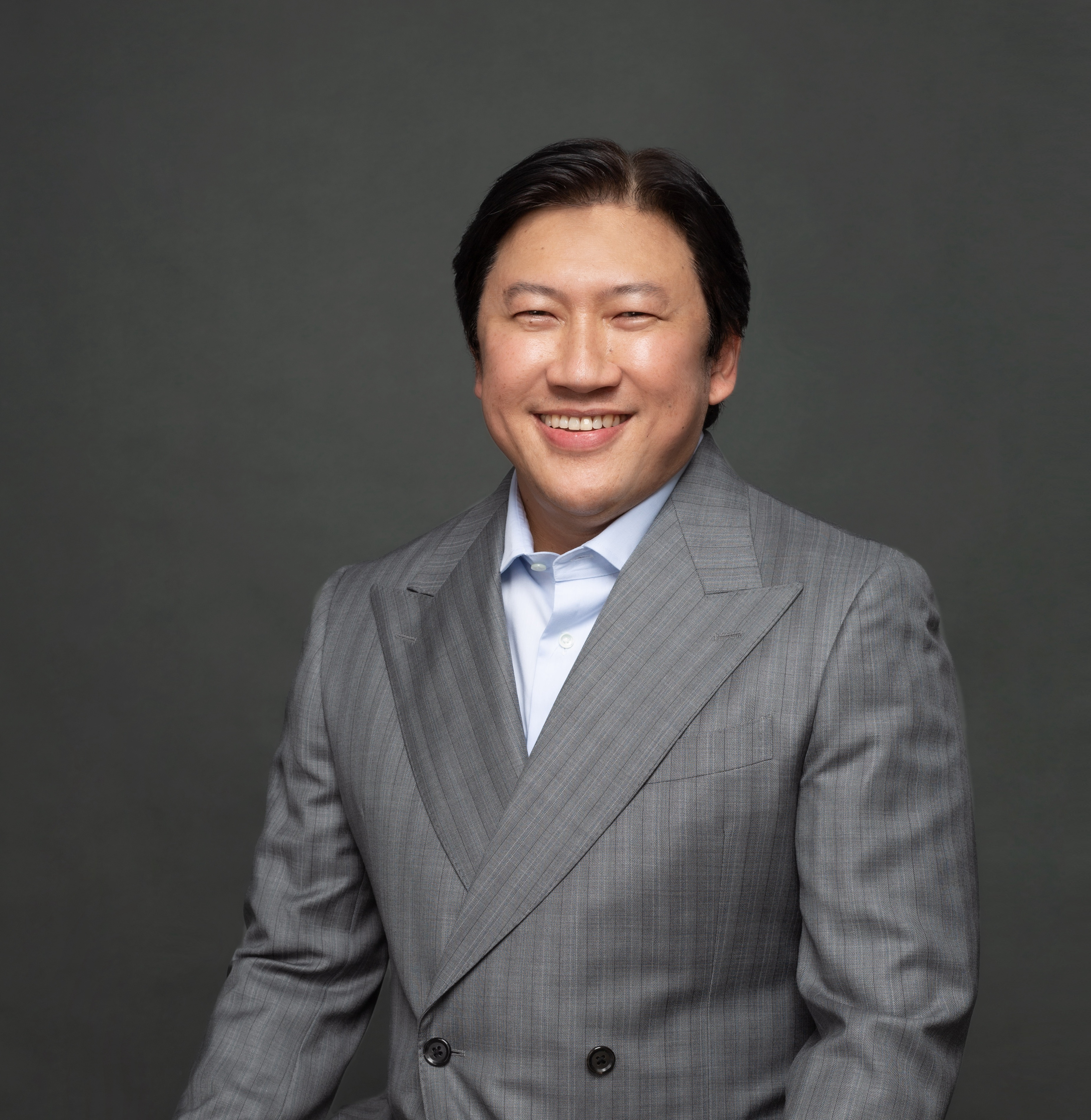 Professional headshot of Singkorn Dhepyasuvan